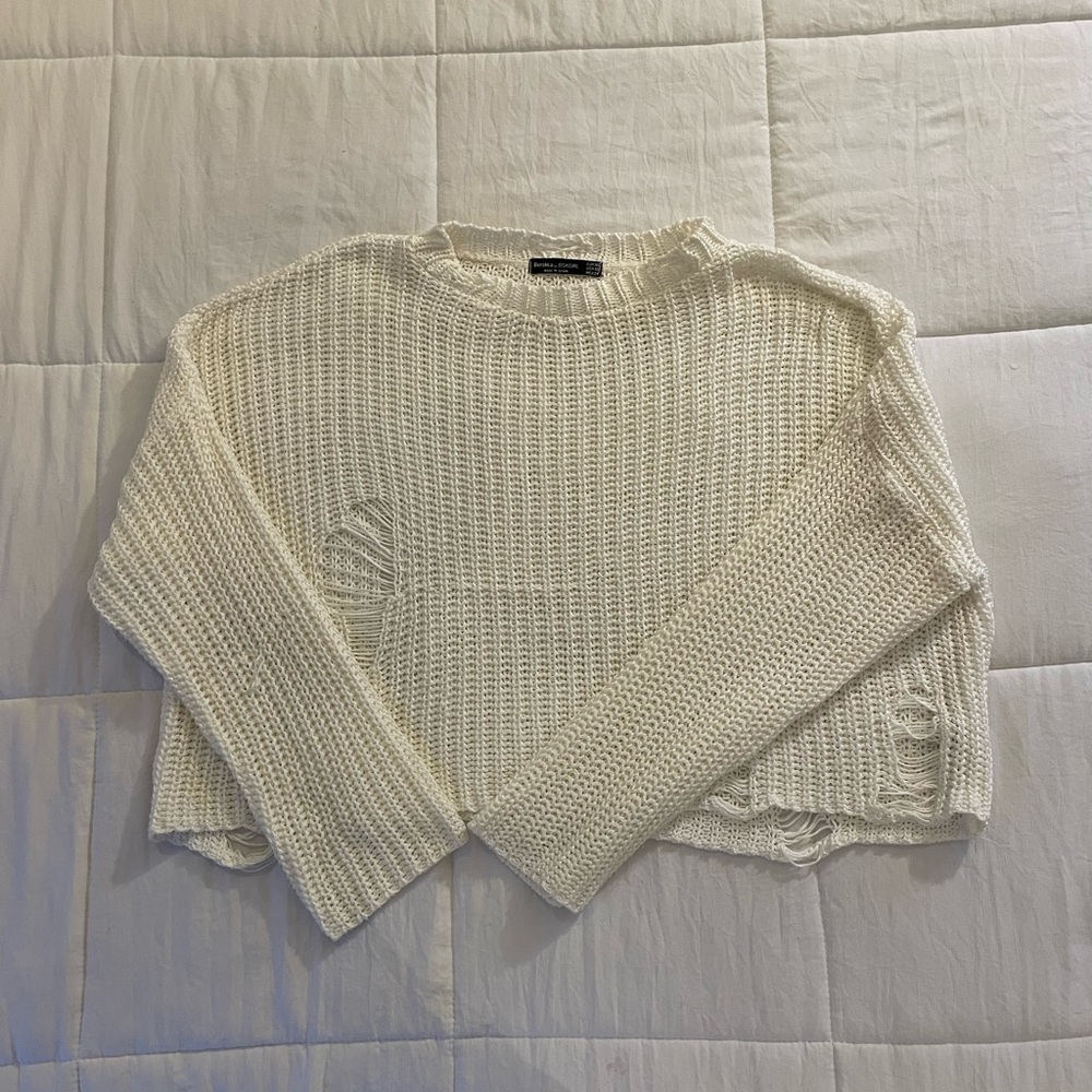 White distressed knit sweater